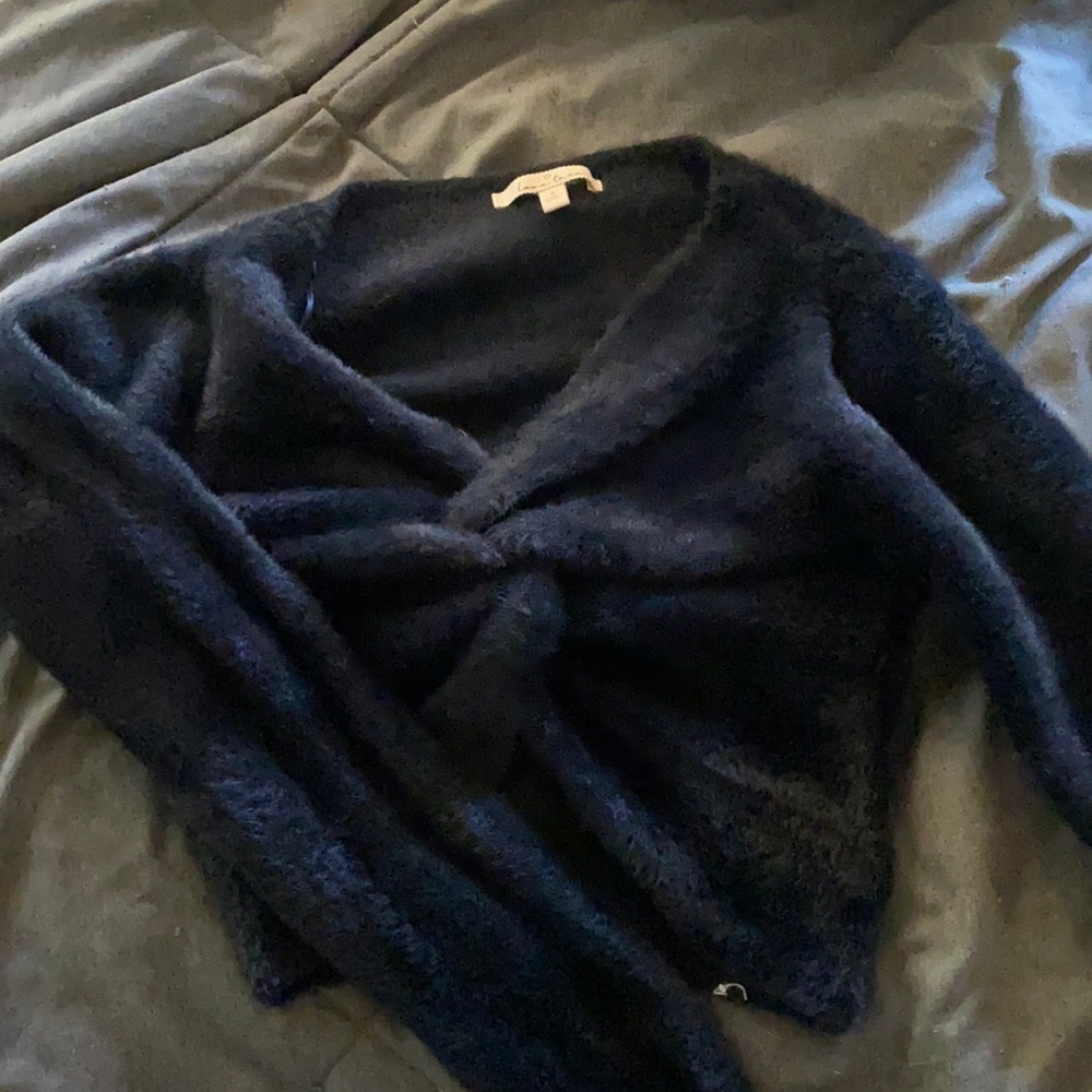 Black knotted sweater